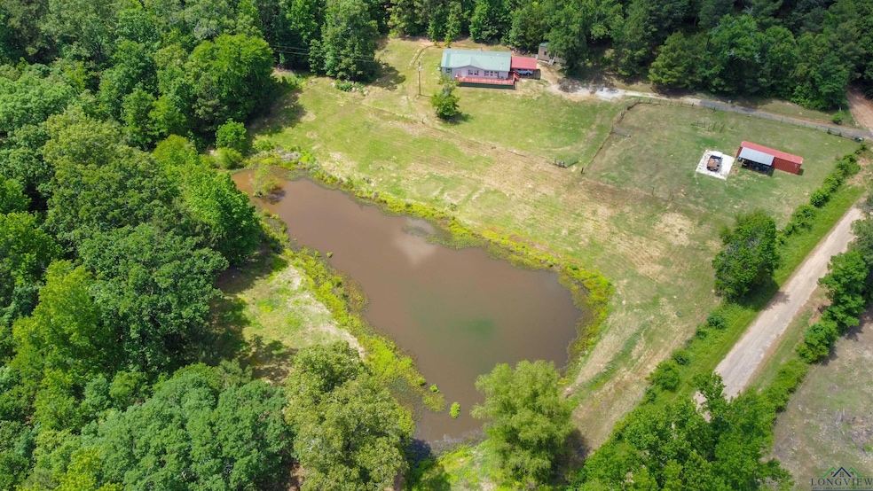 Aerial view of property and surrounding area featu