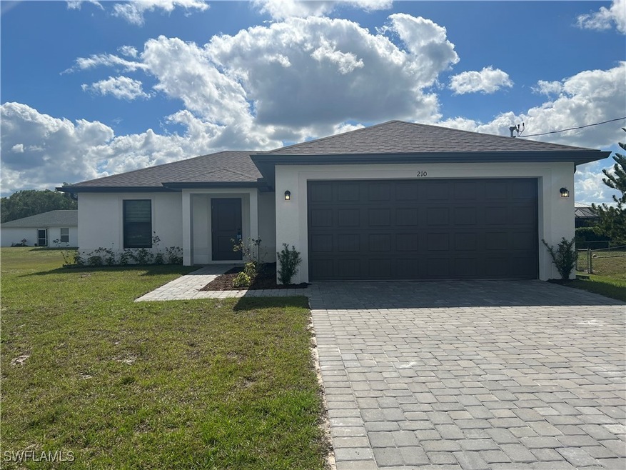 210 Des Cartes St, Lehigh Acres, FL 33913 - photo 1