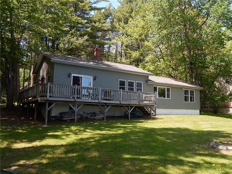 Exterior back facing the pond
