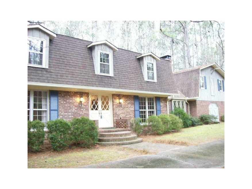 Exterior Front. This custom home is 4 sided brick 