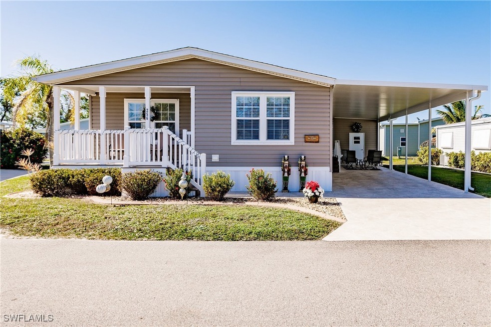 MHome with a front yard and a carport