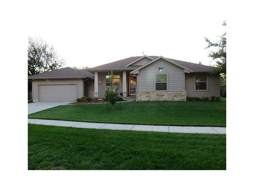 Front Exterior. Custom-designed arts-and crafts ra
