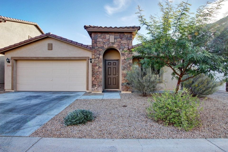 Home Front with veneer rock entry