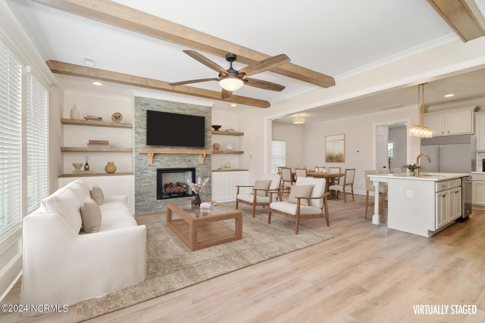 Living Room w/ Fireplace & Builtins