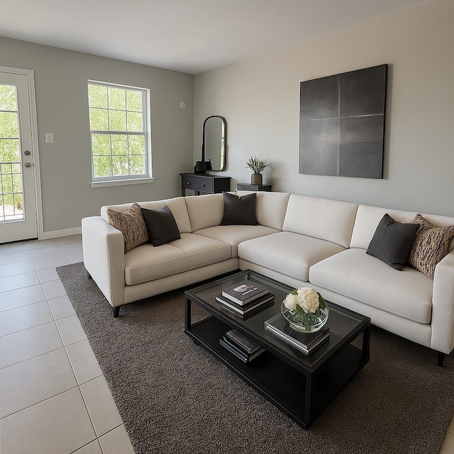 Comfortable living area with large windows, modern