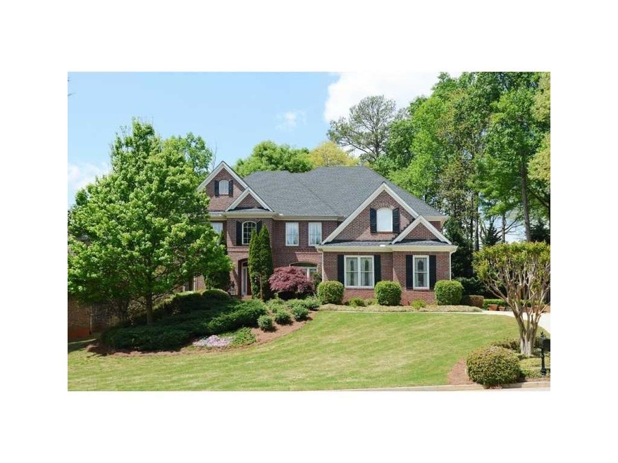 Exterior Front. Five bedrooms, four baths on full 