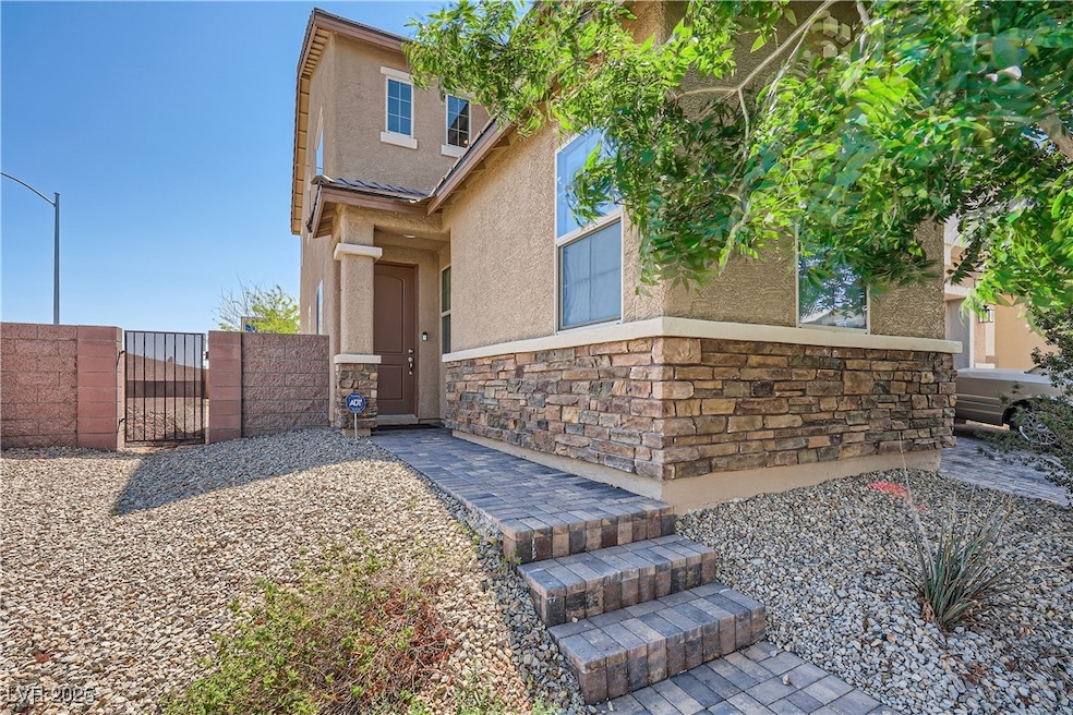 View of front of property featuring stucco siding,