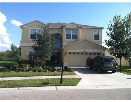 9712 Maxson Dr, Land O Lakes, FL 34638 - photo 1