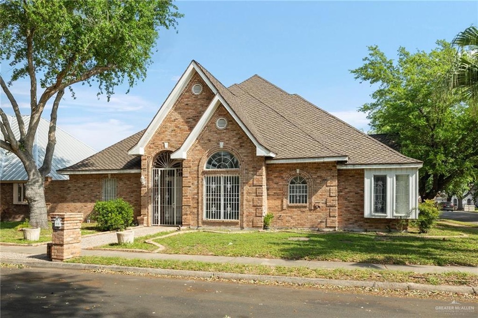 View of front of property with a front yard