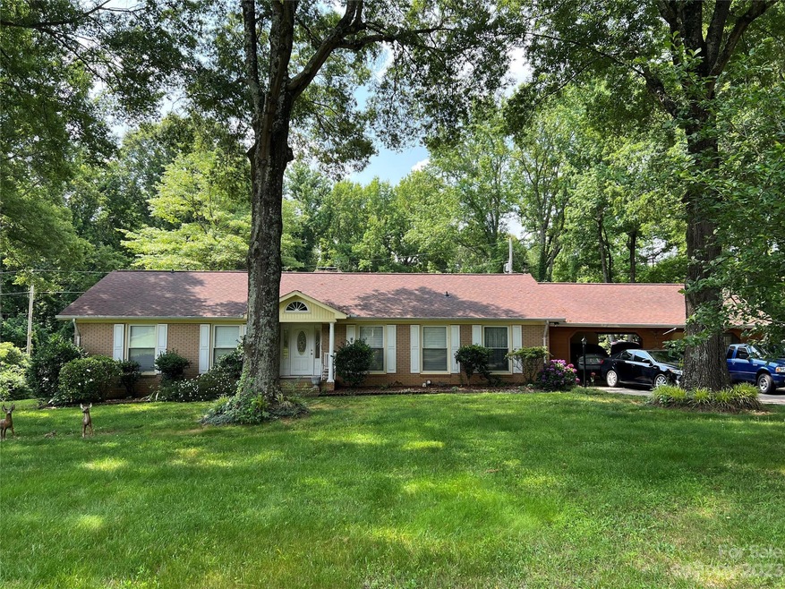 Front View, Huge 2 car carport could cover to garage