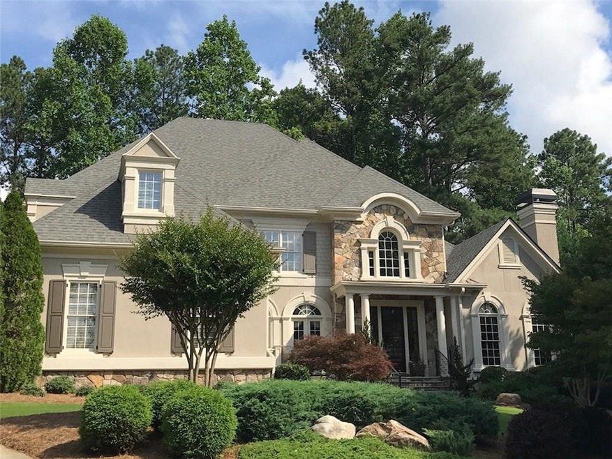 Beautiful stone and hardcoat stucco on quiet cul-d