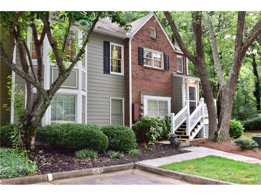 End Unit Condo with Wooded Views!