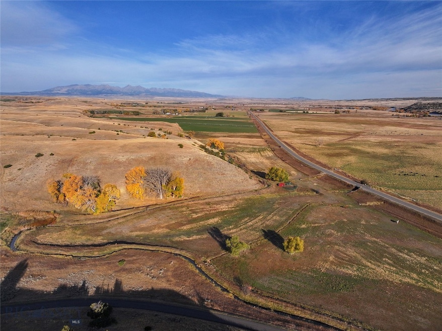 Birds eye view of property featuring a mountain vi
