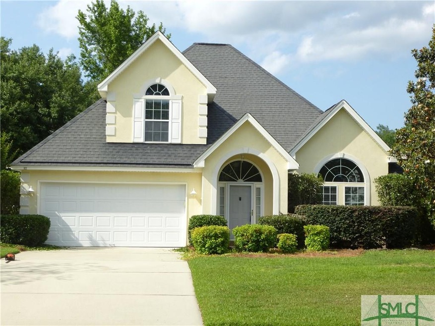 This beautiful stucco home is situated on a corner