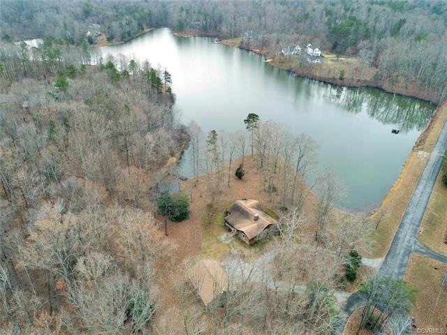 11 peaceful acres on the lake with detached garage