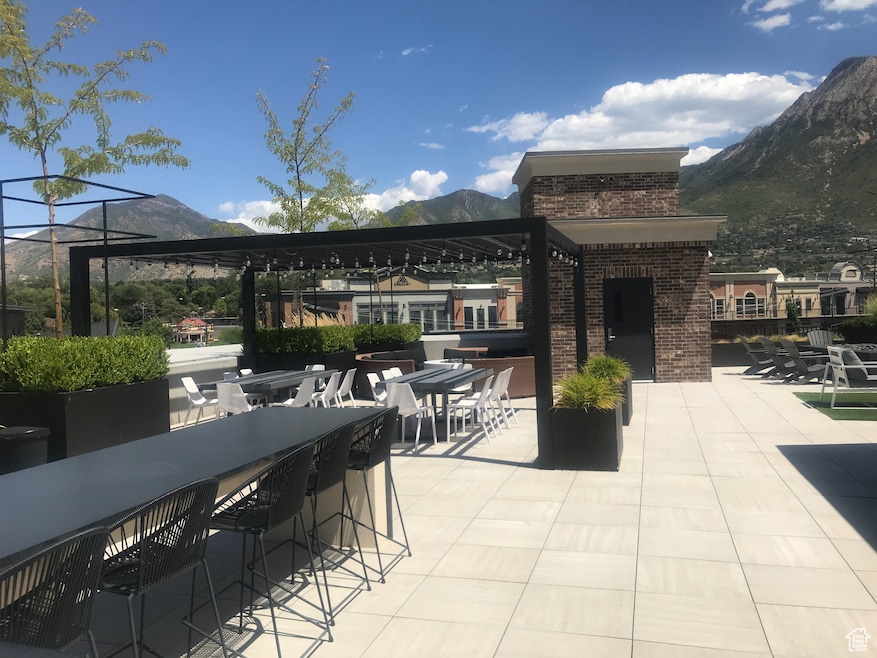 View of patio / terrace featuring a mountain view