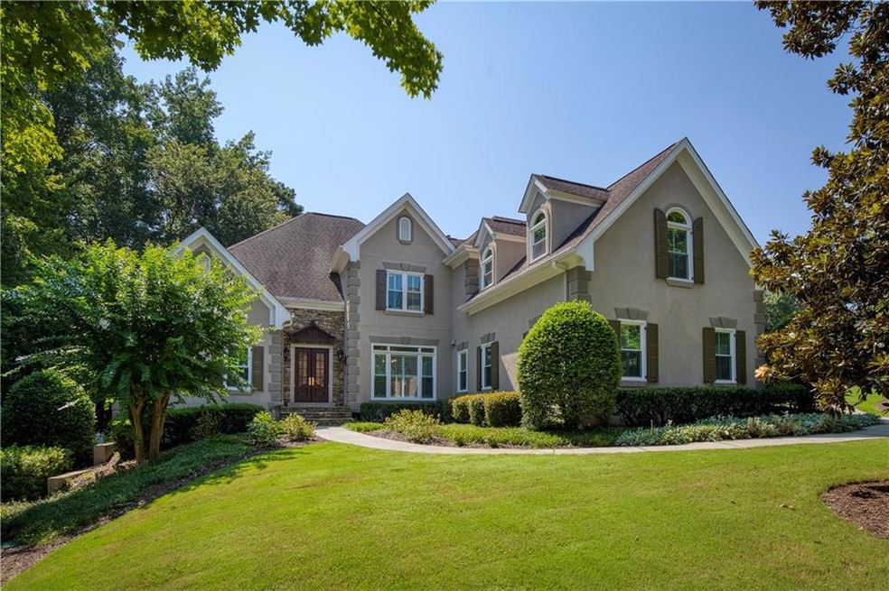 View of property featuring a front yard