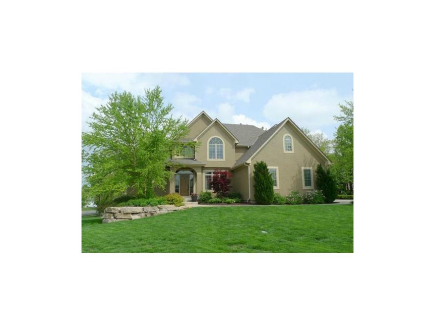 Lovely landscaping surrounds the home