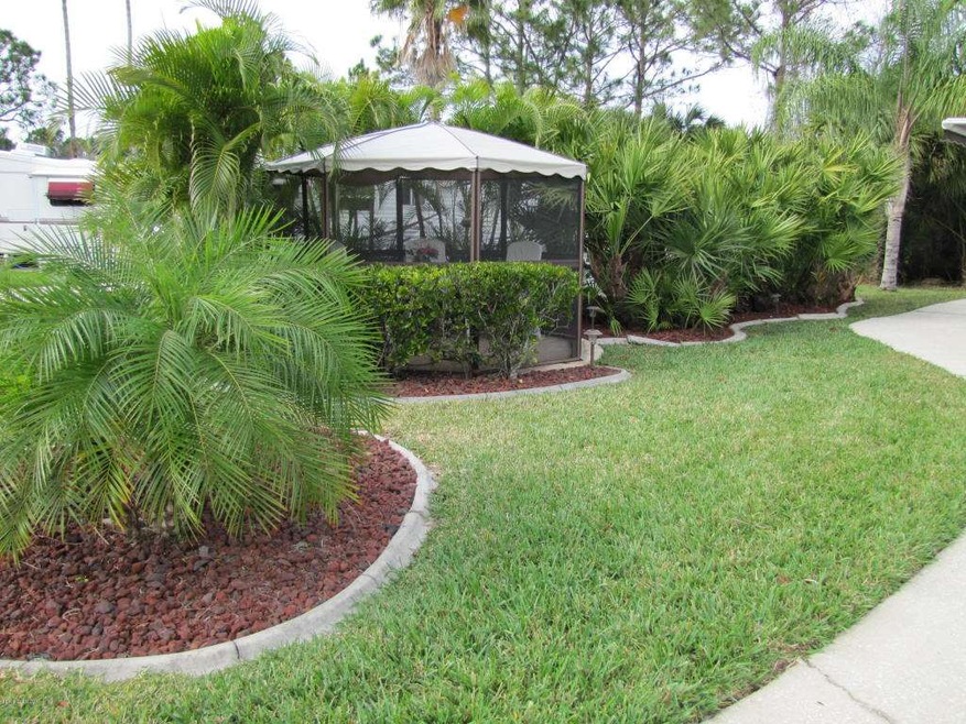 161 Plantation Dr, Titusville, FL 32780 - photo 1