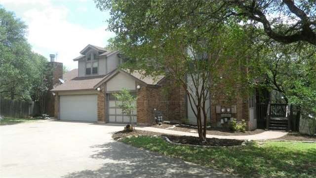 Side entry garage with unit in back.