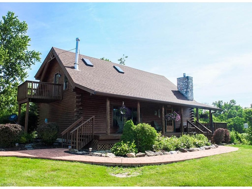 Sitting on over 6.5 acres with a private, stocked 
