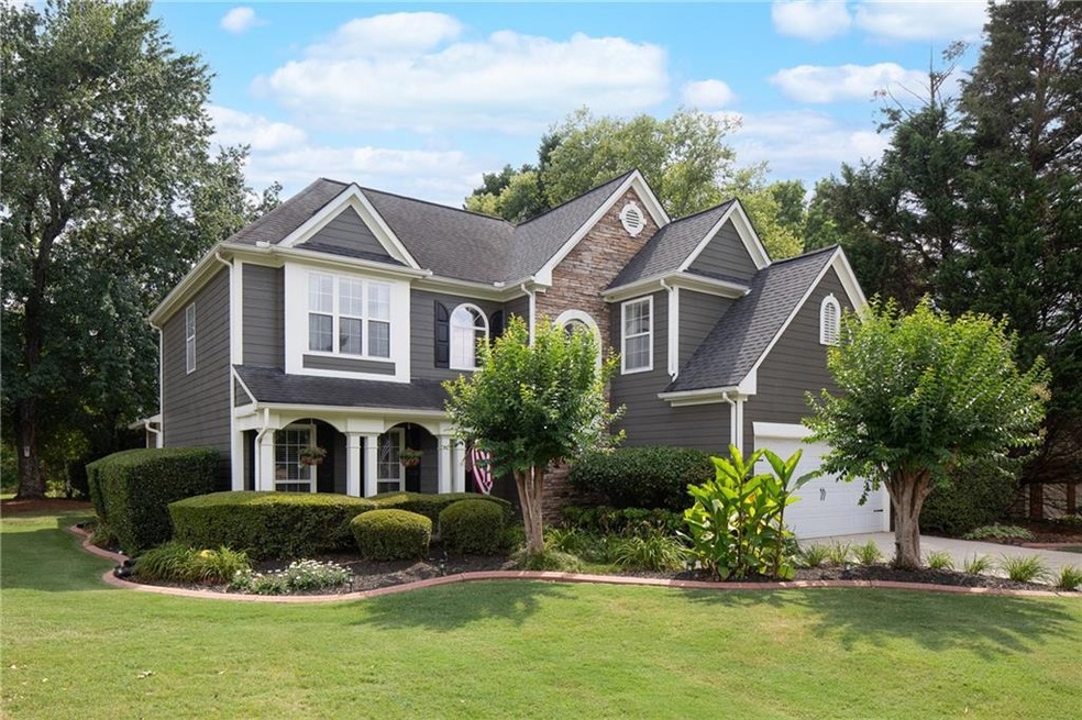 View of front of property with professional landsc