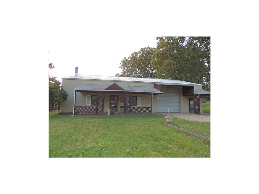 64x40 building on 2.58 acres to live and work or c