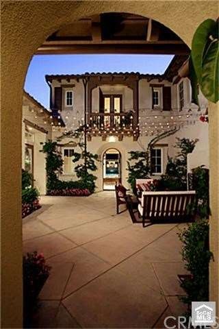 Front Courtyard Entry includes a fireplace and doo