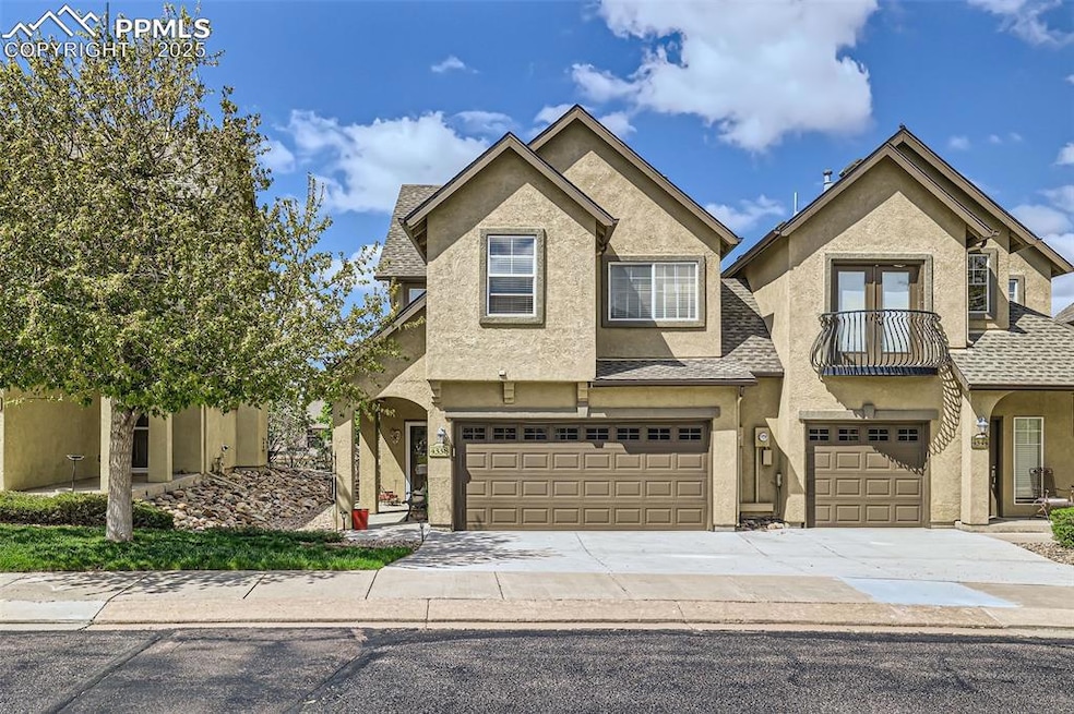 View of front of property featuring stucco siding,