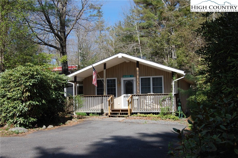 Cozy, nestled-in bungalow with one of three porche