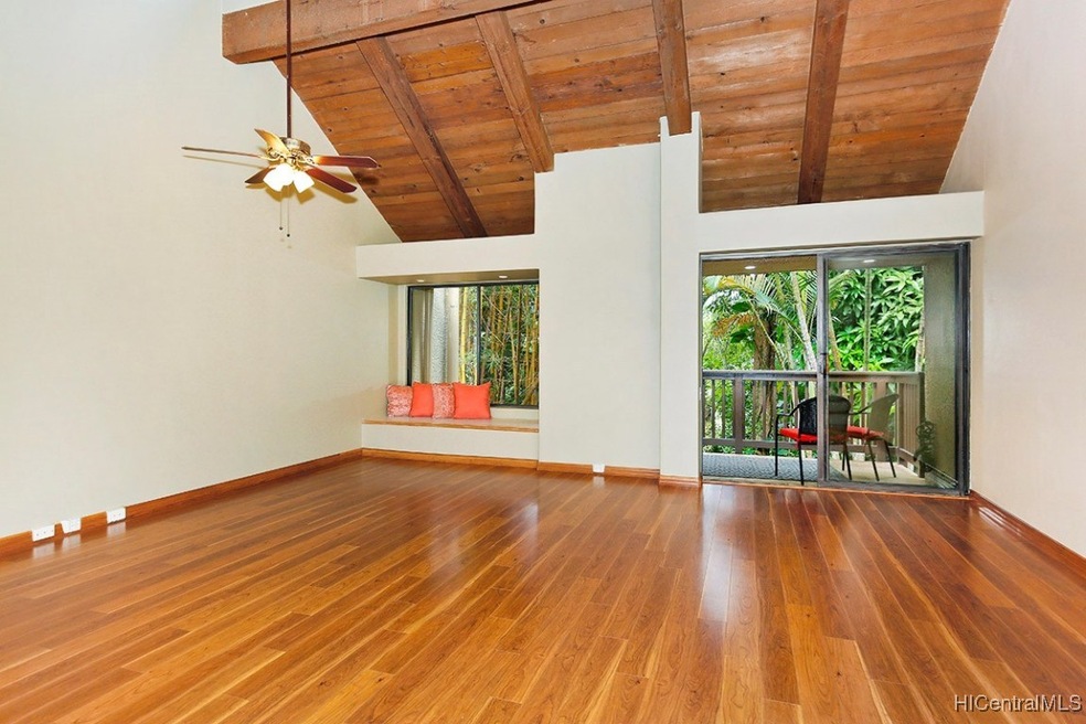 Expansive living room with cathedral ceilings and