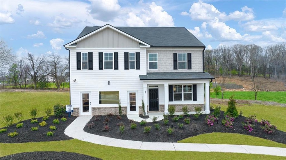 View of front of home featuring a front lawn