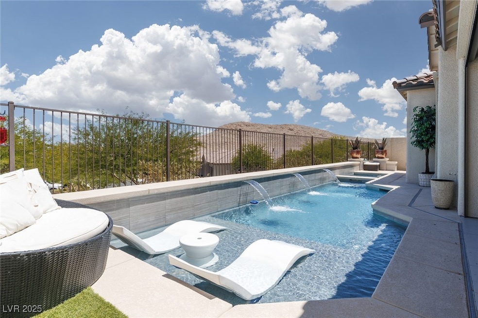 View of swimming pool featuring a fenced backyard