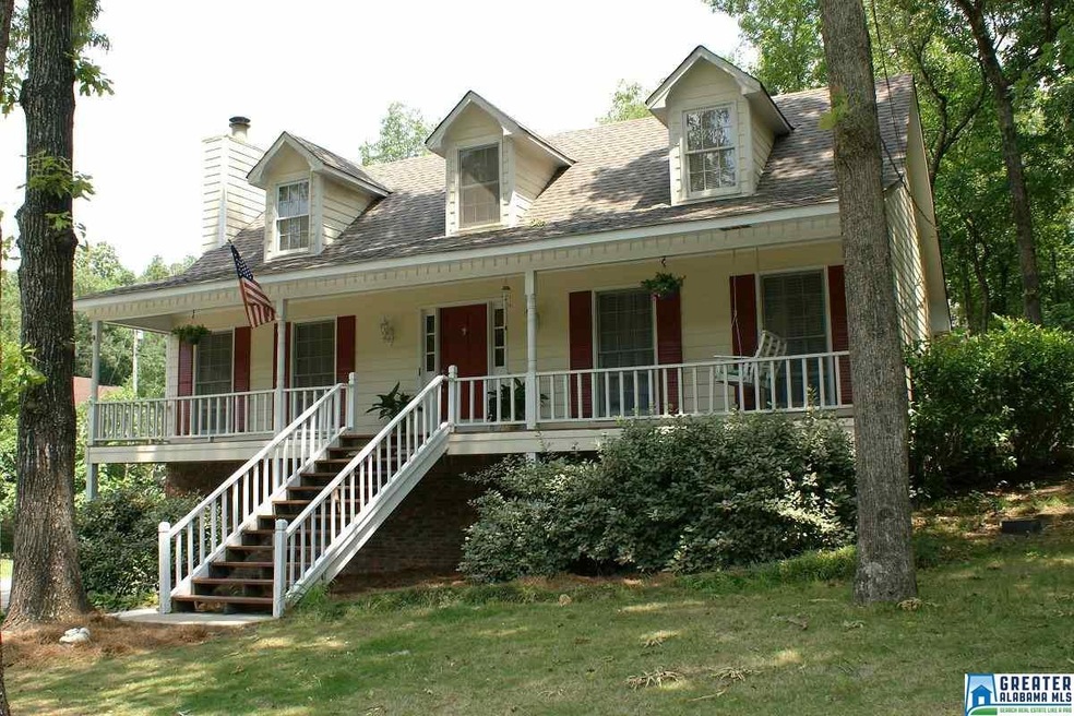 Charming front porch on large corner lot