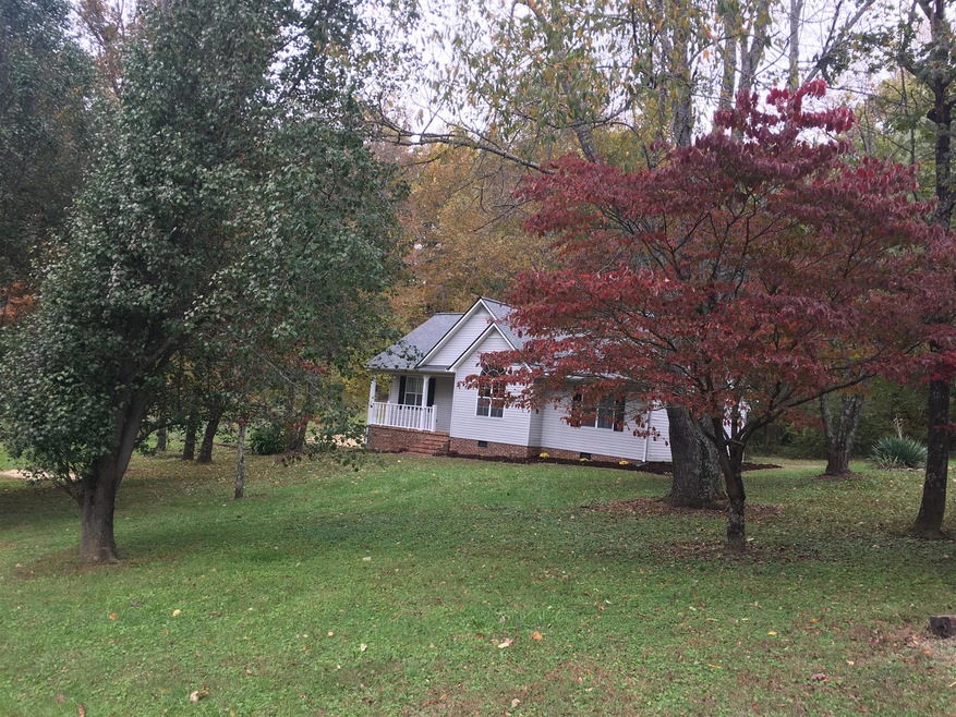 View of the Large Yard and Beautiful Country Setting.