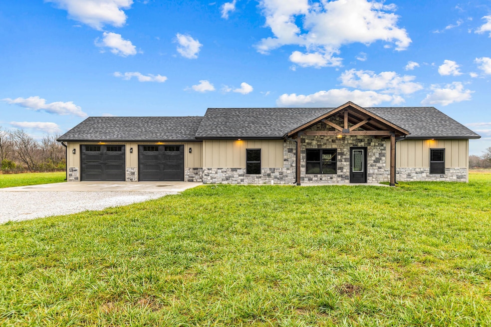 5764 Lawrence 1032, La Russell, MO 64848 - photo 1