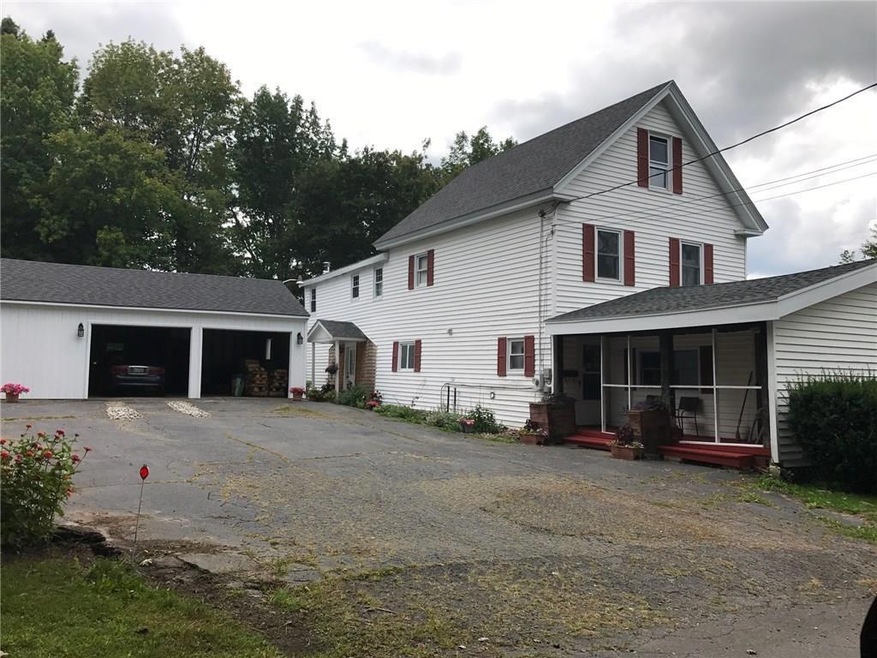 Large driveway and over sized garage