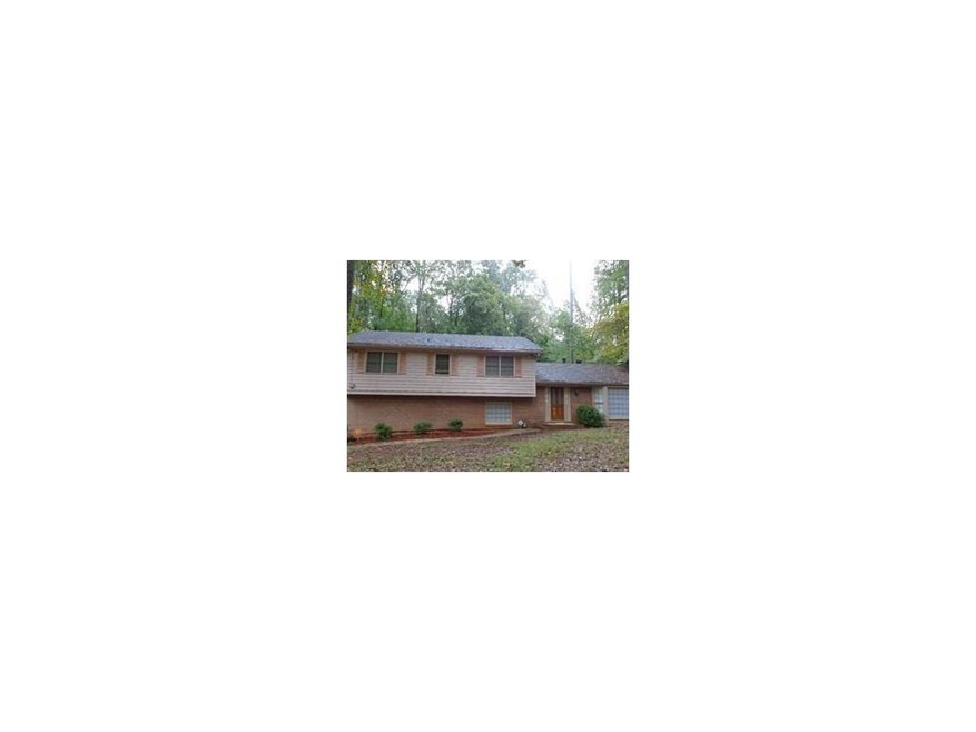 Side-Drive Brick Home with a lot of Space inside a