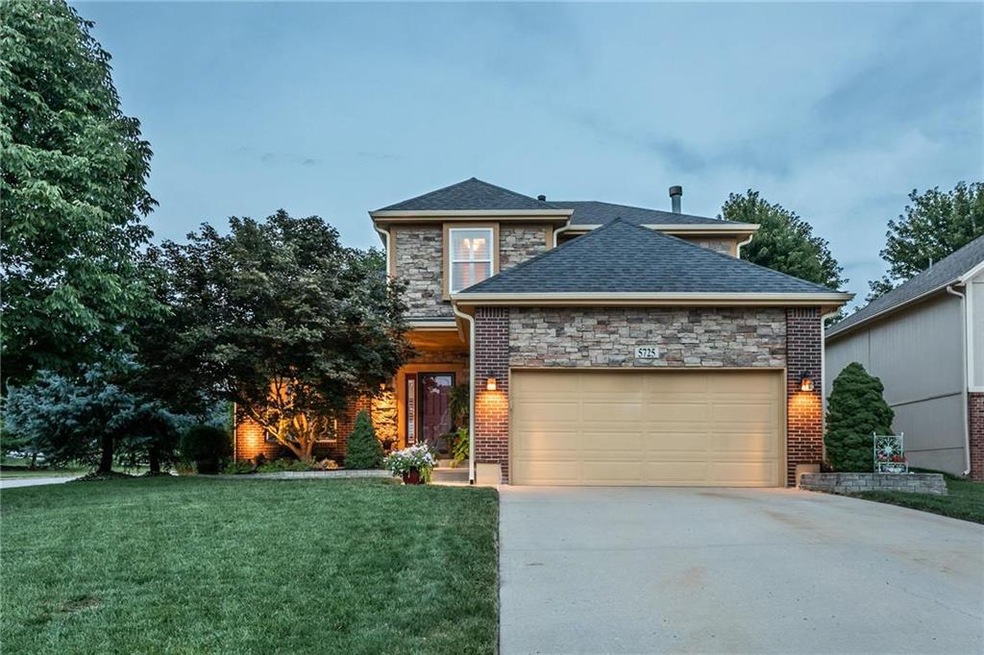 This three bedroom, two full and one half bath hom