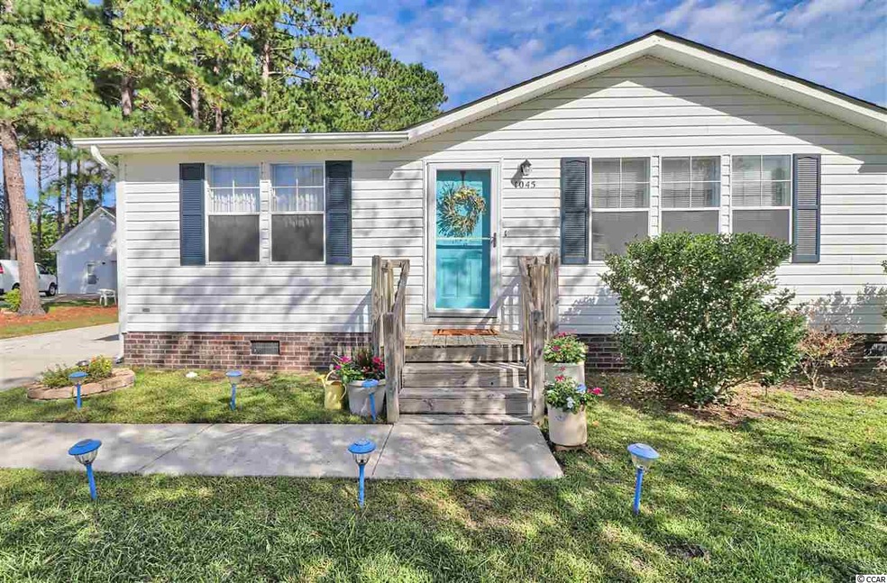 1045 Putting Ln, Carolina Shores, SC 28467 - photo 1