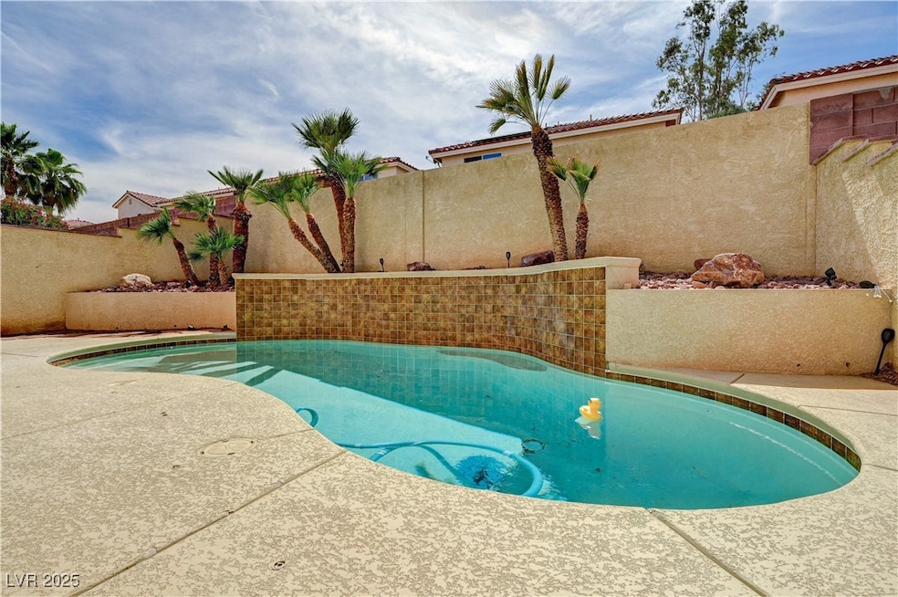 View of swimming pool featuring a fenced backyard