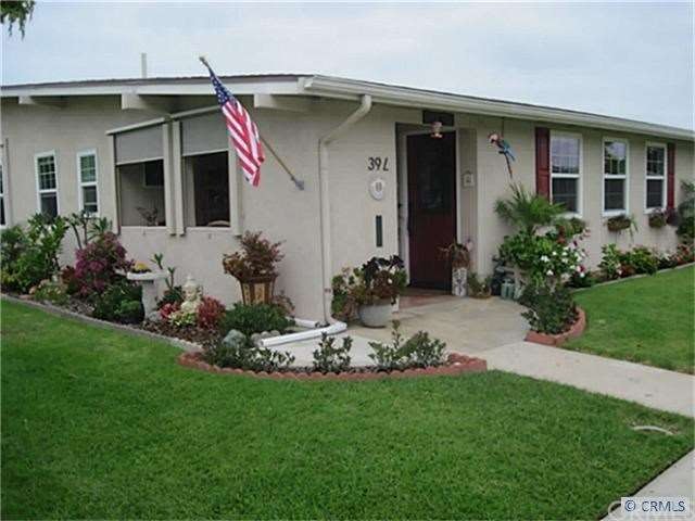 Beautifully landscaped front  and side of the home