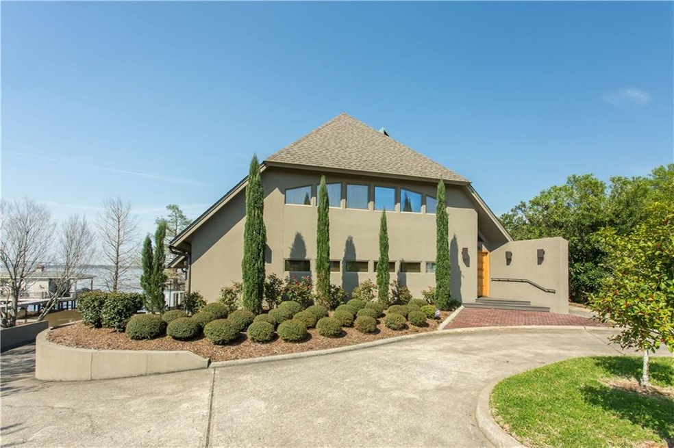 Exterior Front.  Lake Charles can be seen in the b