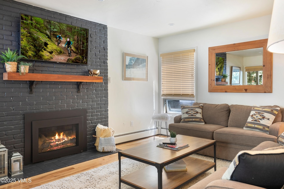 Bright living room with gas fireplace