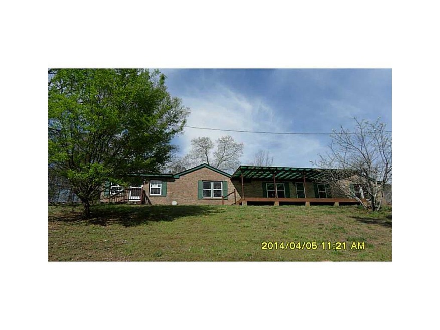 Exterior Front. Brick ranch/mobile on 5.99 acres w
