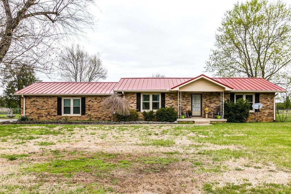 Country living right outside of Murfreesboro. Home on over 9 acres.