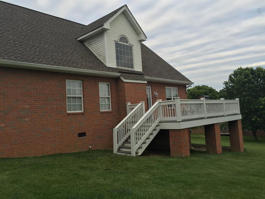 Huge deck on back and large storage area under house