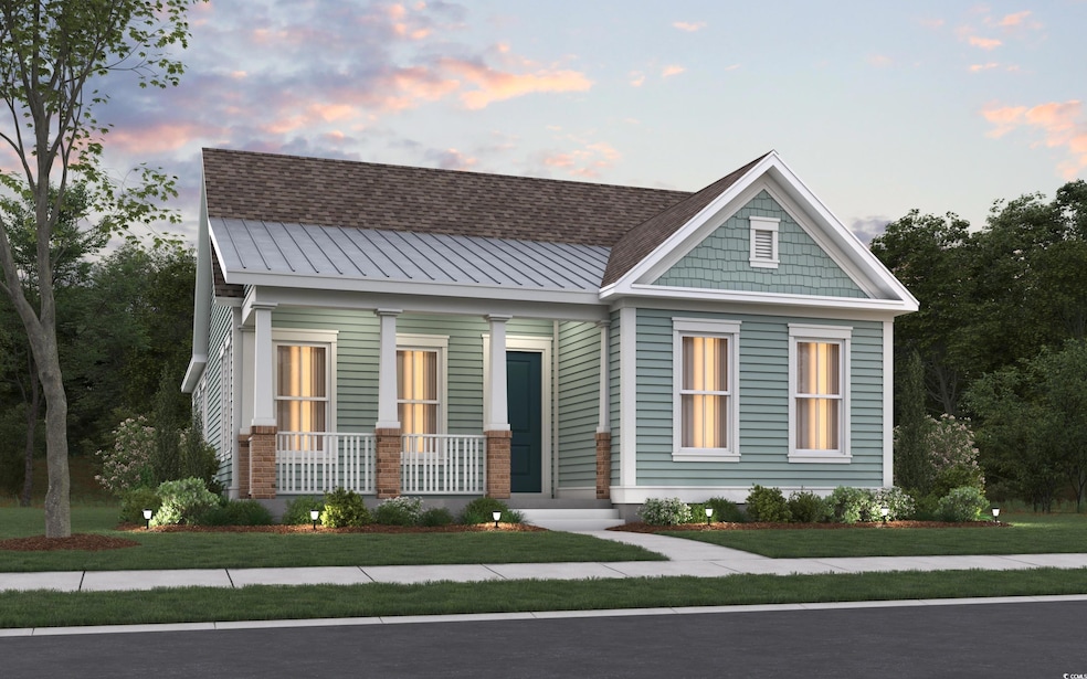 View of front facade with a porch, metal roof, and