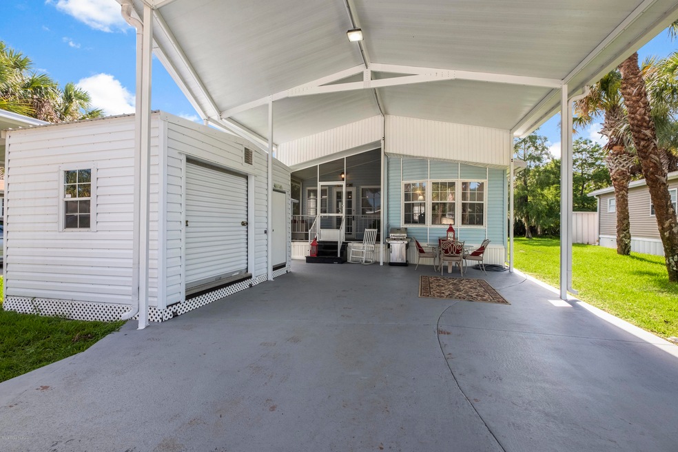 273 Plantation Dr, Titusville, FL 32780 - photo 1