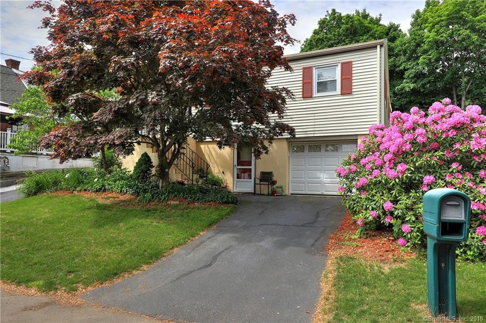 Beautiful Tree does block how cute this Home is. H